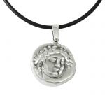 Amphipolis, Pendant with the head of Apollο, in silver 999°.