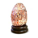 Egg, Candlestick, Shiny copper and placed on a wooden base