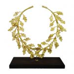 Oak Wreath, Gold-plated 24K handmade brass, placed on a wooden or a black marble base.