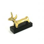 Small bull figurine in solid brass placed on a black acrylic base. Muma.gr