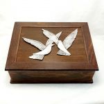 Doves, Box, Copper relief representation of doves, plated in silver solution 999°, mounted on a handmade wooden box.