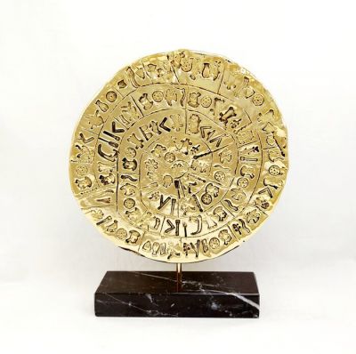 The disc of Phaistos. Handmade copy depicting both sides in gold-plated 24 K gold solution, based on black Greek marble.