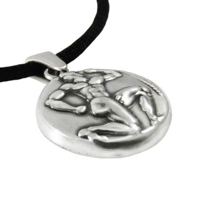 Phaistos Disc Silver Pendant. On the reverse Minotaur is depicted. Handmade of solid silver 925° on museummasters.gr.