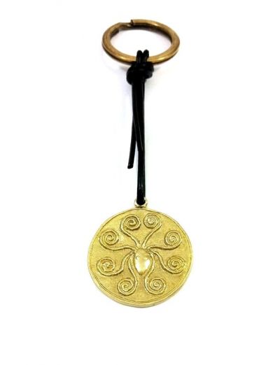 Mycenaean octapus golden hair decoration. Handmade shiny solid brass, available as a key-ring as well. Offered in gift packaging.