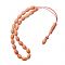 Worry bead, made of sponge coral beads.